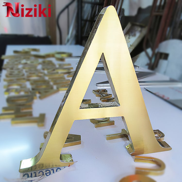 Gáy Chân Chữ Inox 201 Vàng Xước